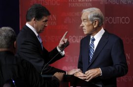 Perry appears upset that Ron Paul mentioned his prior support of Hillary Clinton's health plan